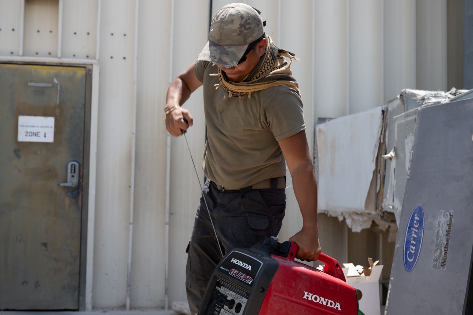 379th ECES HVAC technicians combat rising temperatures (8502254). Photo by U.S. Air Force AFCENT by Airman 1st Class Derrick Bole on Wikimedia Commons.
